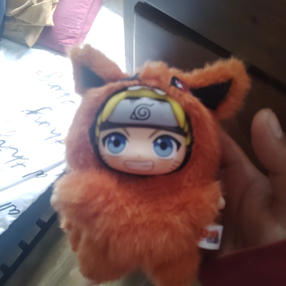 Orange Plush Toy with Character Design